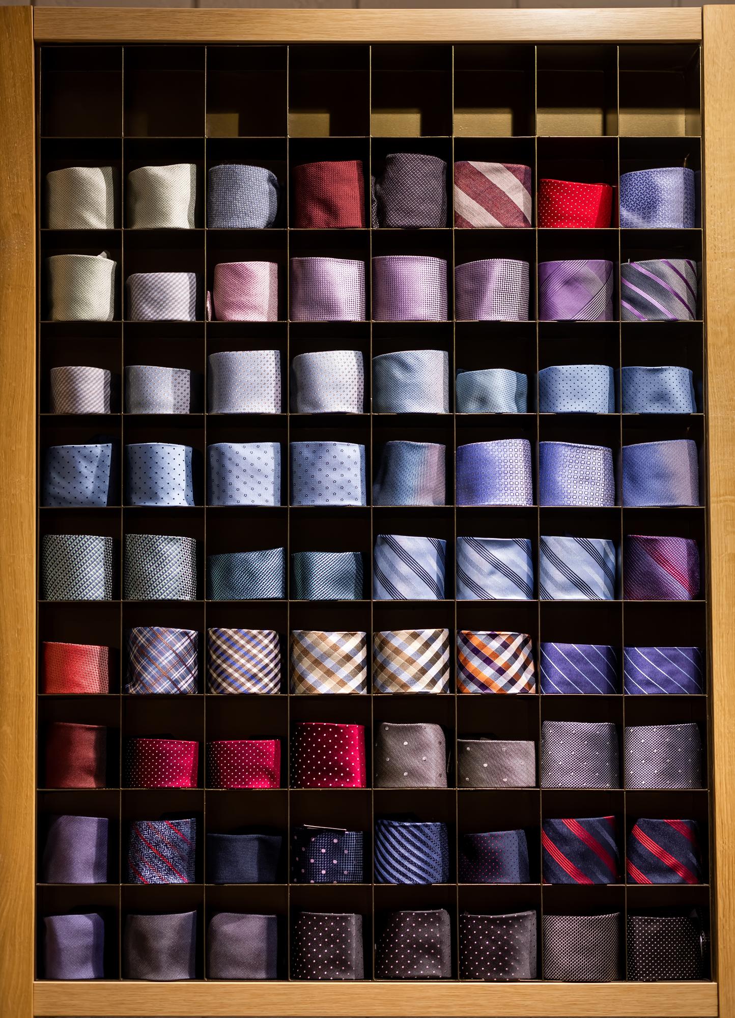 Sample fabric swatches and embroidered motifs